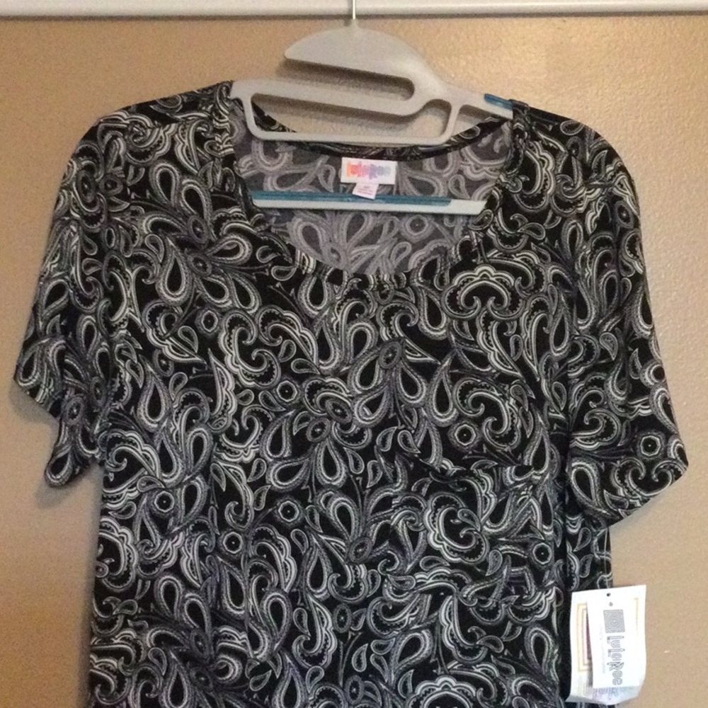 New with Tags Lularoe Carly dress size Medium. Paisley pattern w/ black